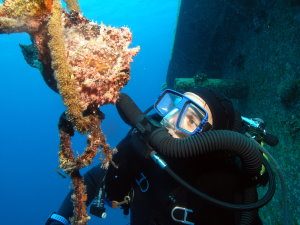 Rebreather diver with frog fish