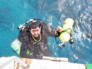 Technical diver at stern of boat