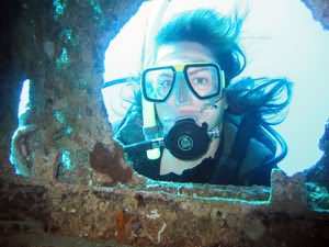 Diver by wreck
