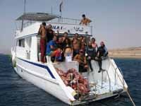 Clean up team on boat