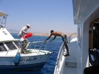 Marine park boat delivers clean up bags