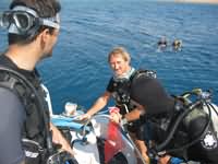 The team enters the water