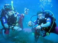Divers with bags