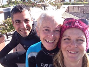 Three happy divers
